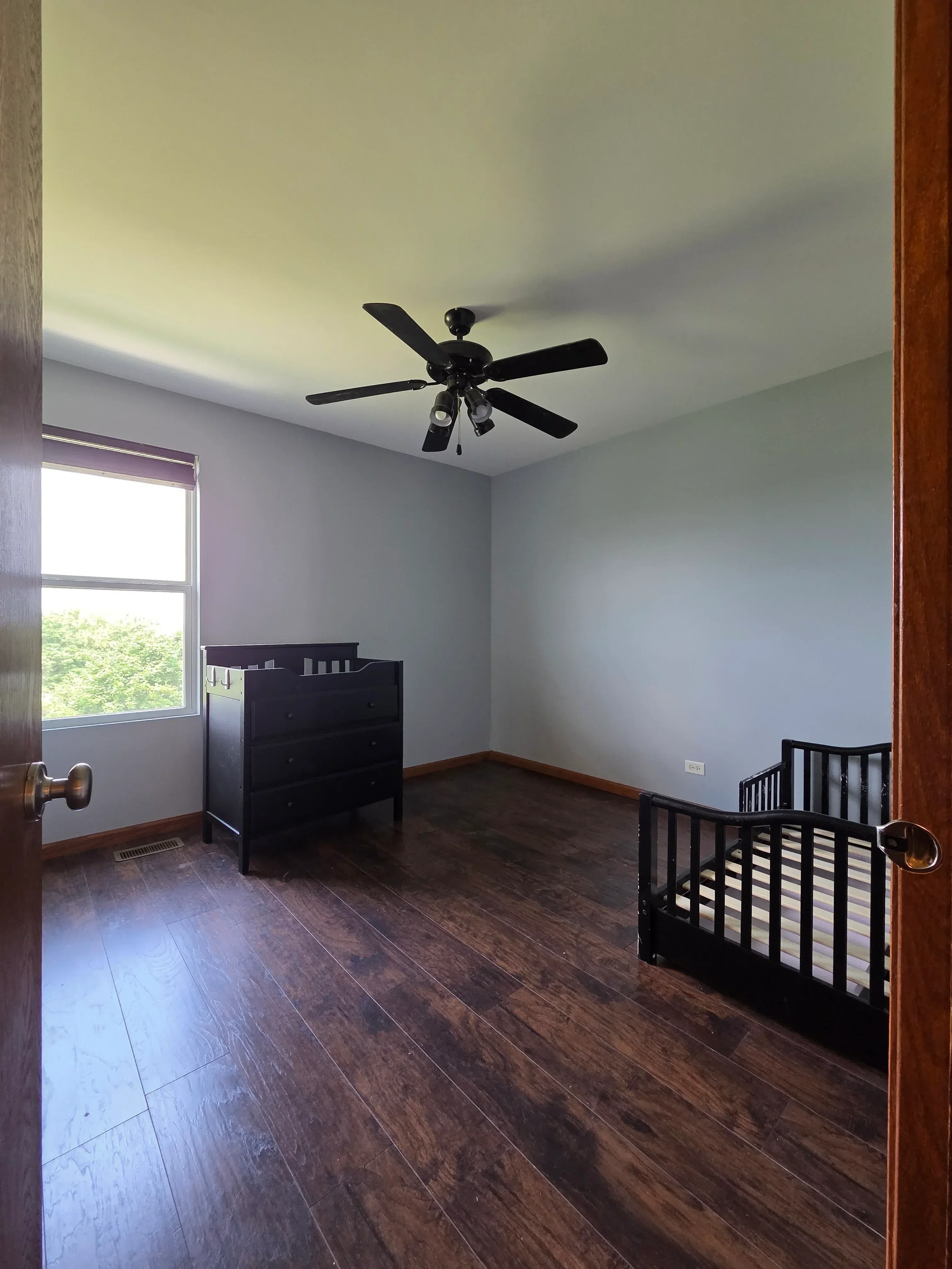 Interior room with painted drywall walls, ceiling, and trim work in neutral colors